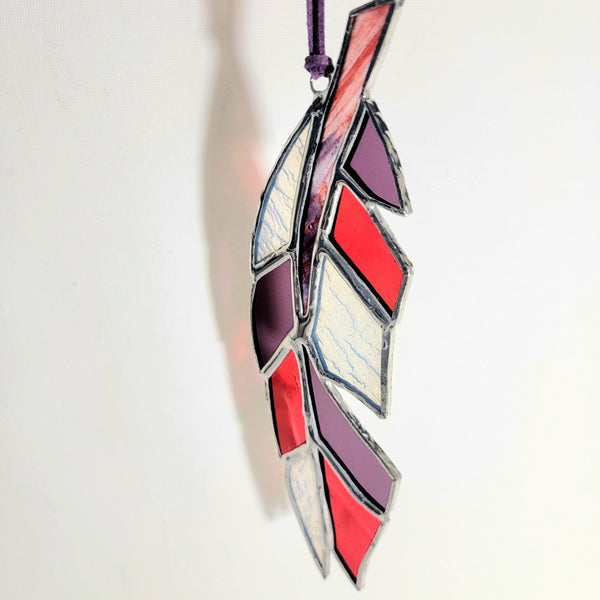 Purple, Red, and Milk Glass Feather