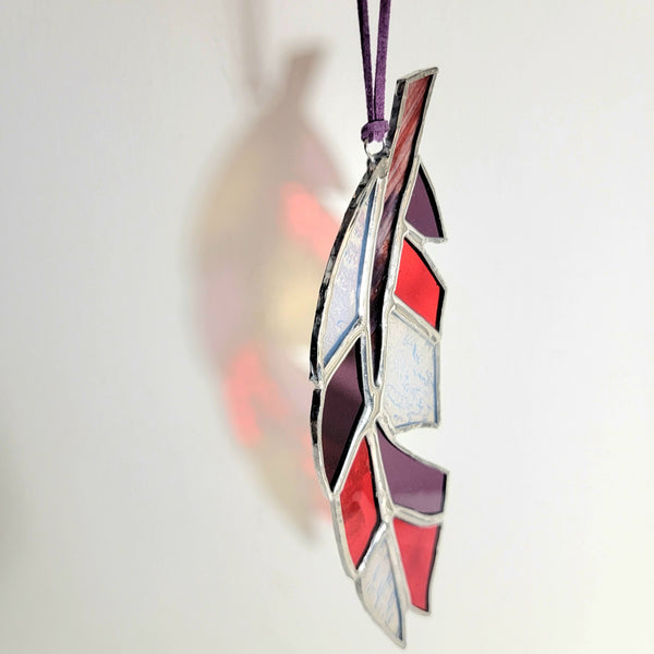 Purple, Red, and Milk Glass Feather